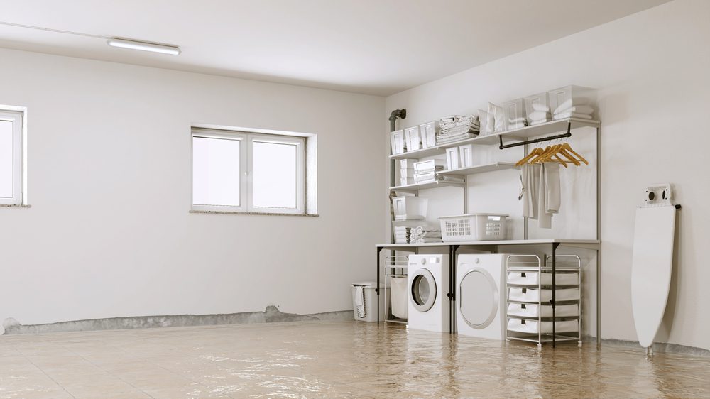 cleaning out standing water from a flooded basement